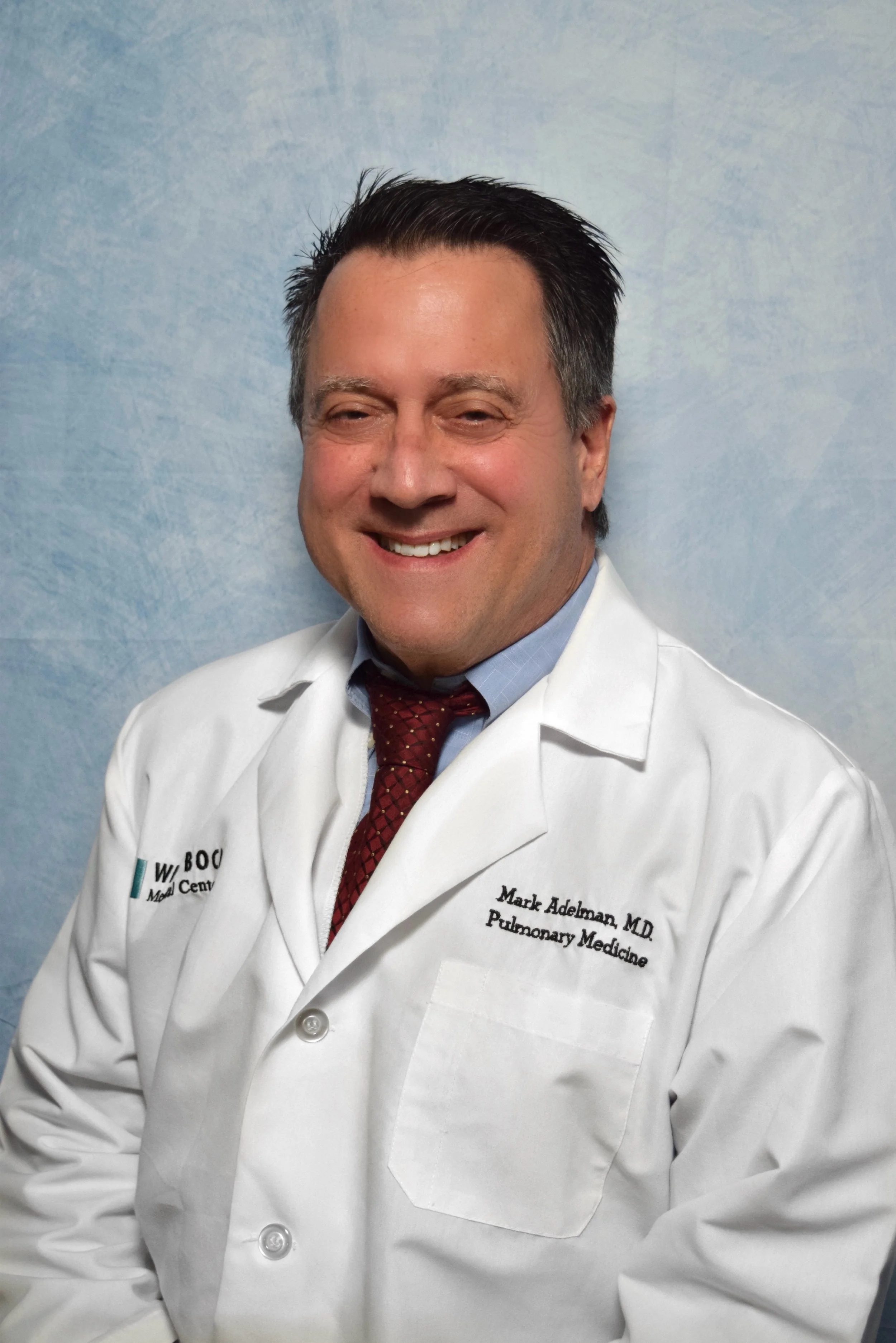 Portrait of Mark Adelman, MD, Pulmonologist · Founder